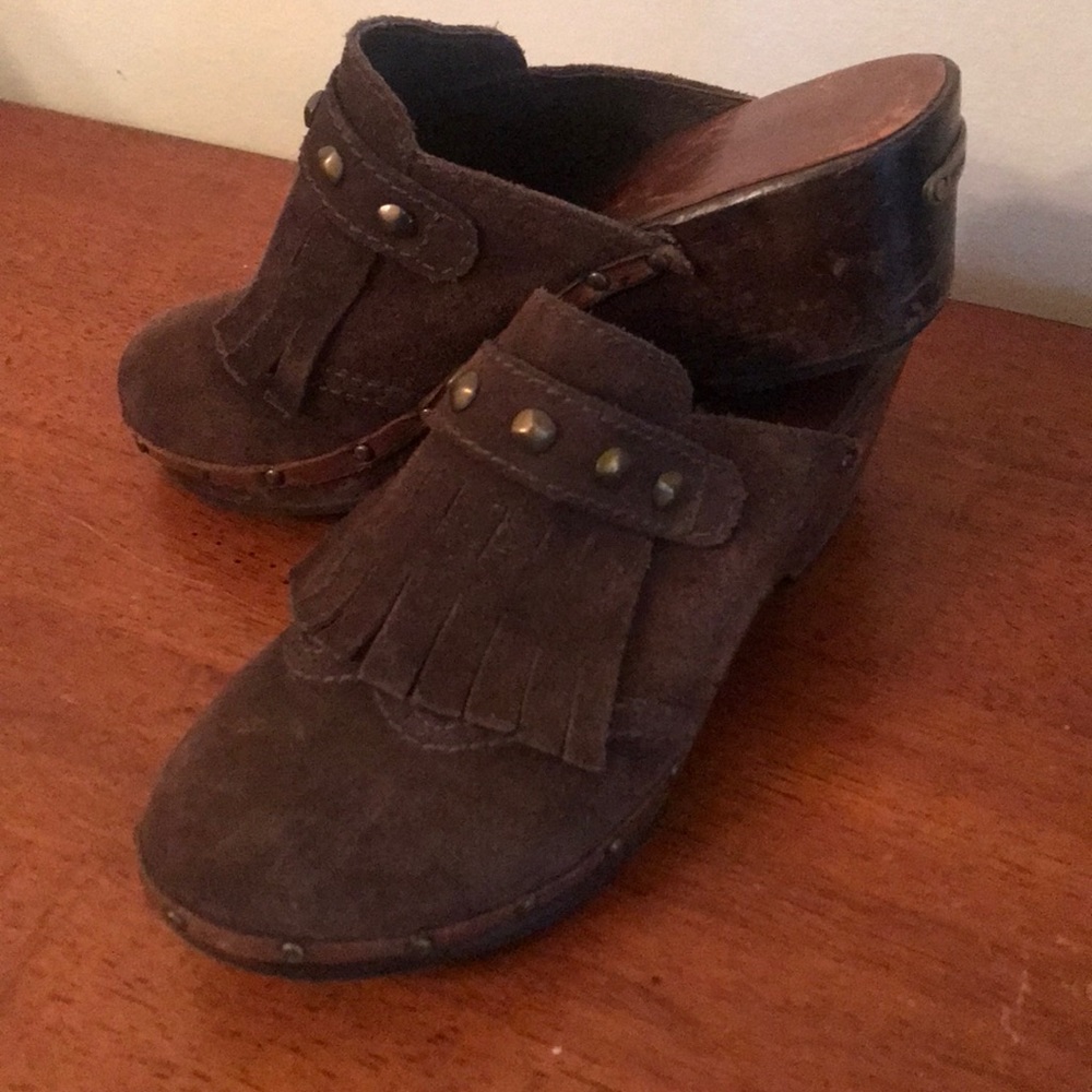 Used Michael Kors wooden clogs. Size 7. Super fun